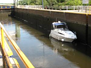 A small pleasure craft awaiting a lift in Lock 17 on the Erie Canal, Little Falls New York