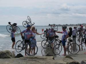 Cyclists celebrate the end of the 3,629 mile ride at Portsmouth, New Hampshire